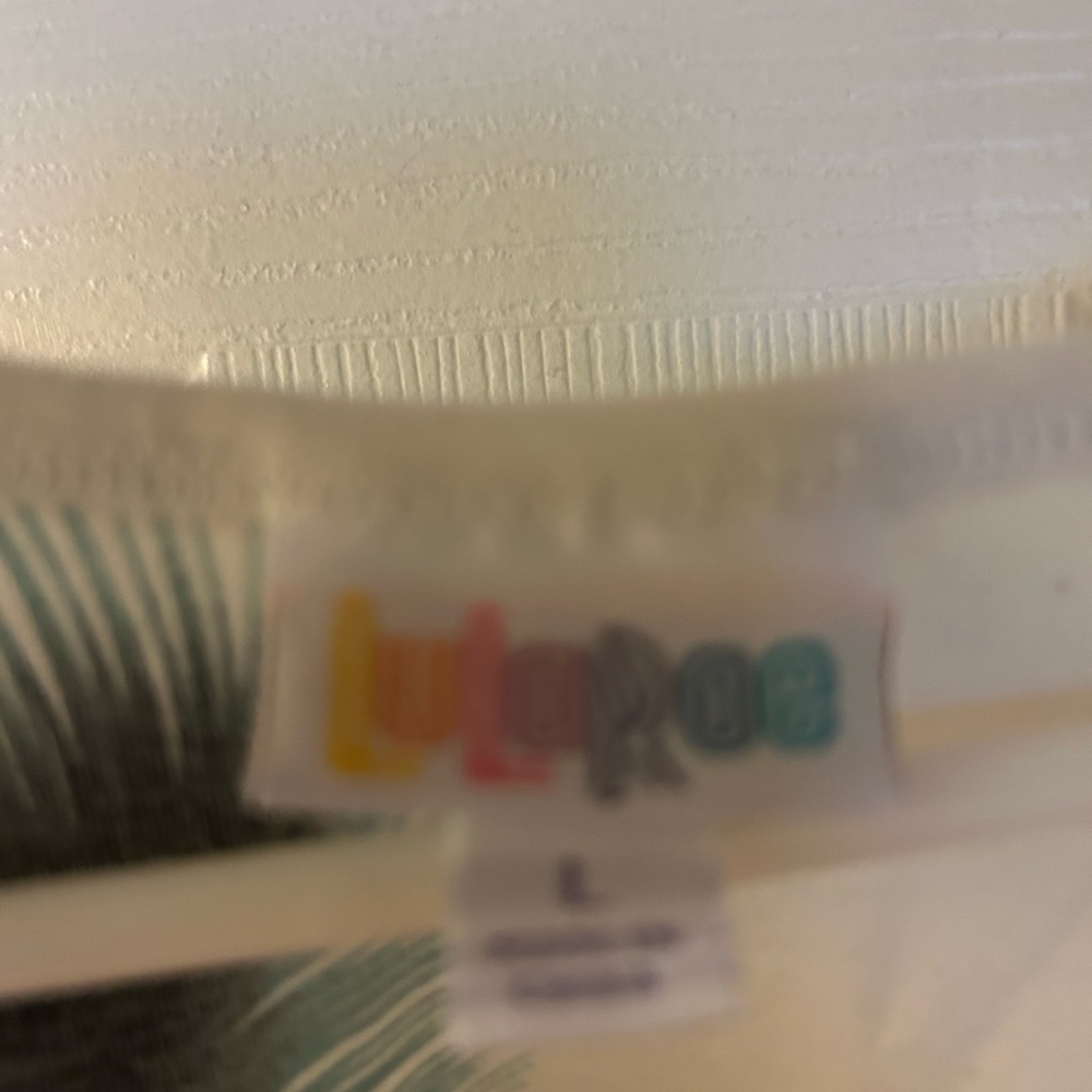 LuLaRoe White and Green Patterned Top